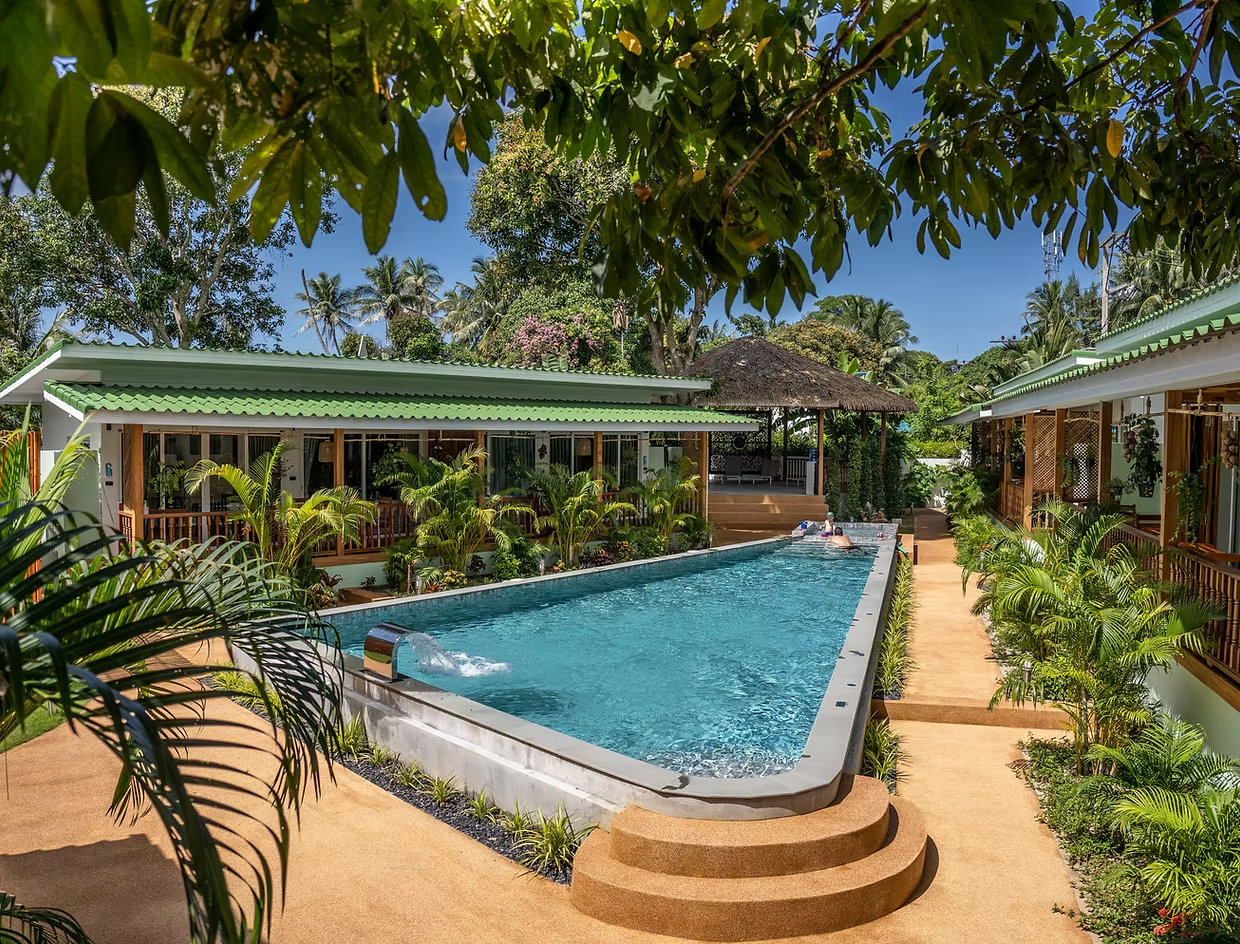 Joy Beach Villas garden pool and villas